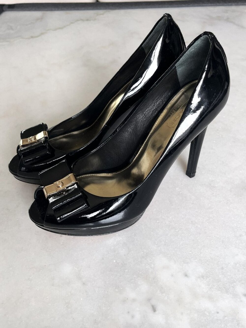 Coach Starla black & gold peep toe high heel shoes with bows patent leather